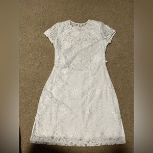 white mini dress with open tie back